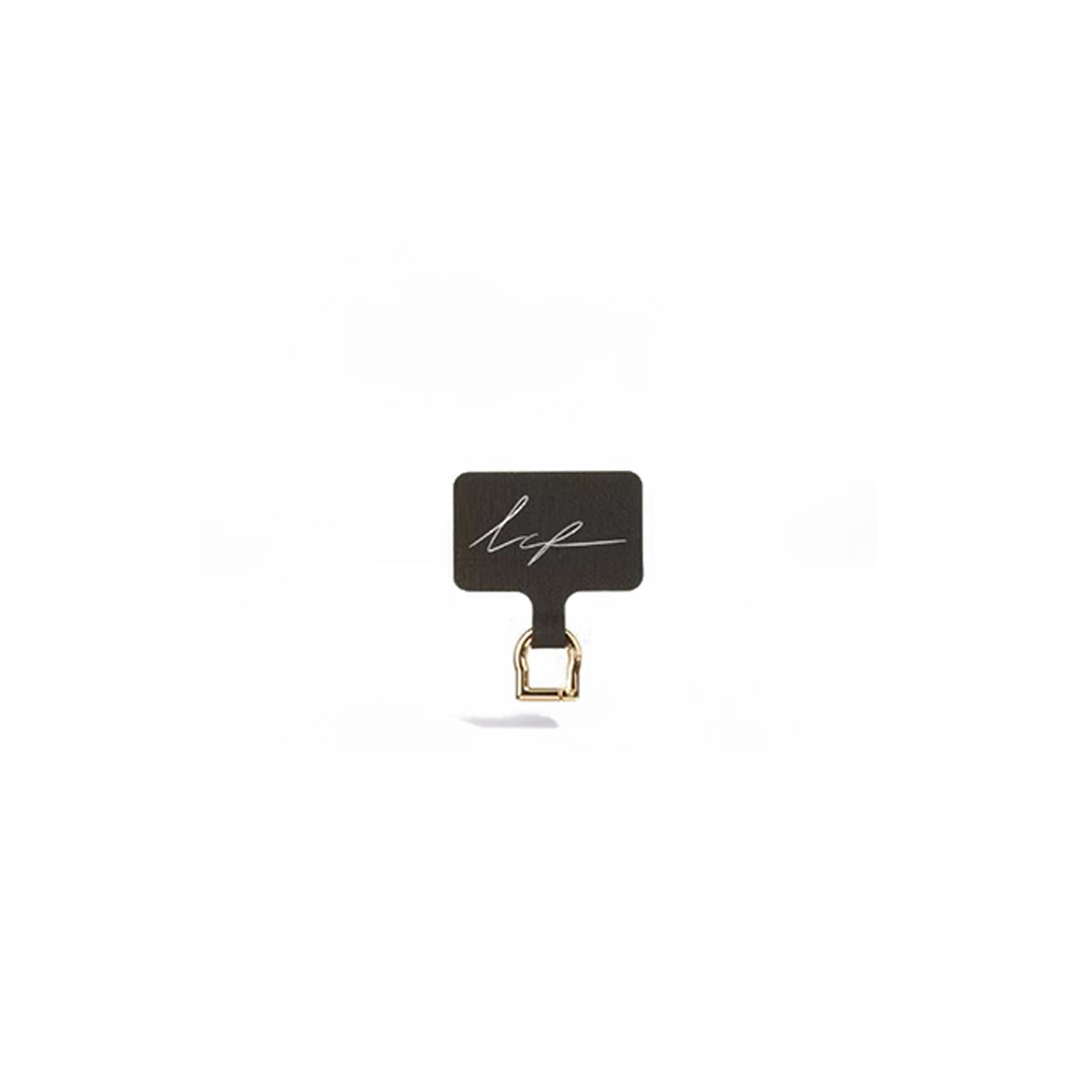 Adaptateur Universel pour chaine de Téléphone, La Coque Française, dipsonible chez Bathroom Graffiti.