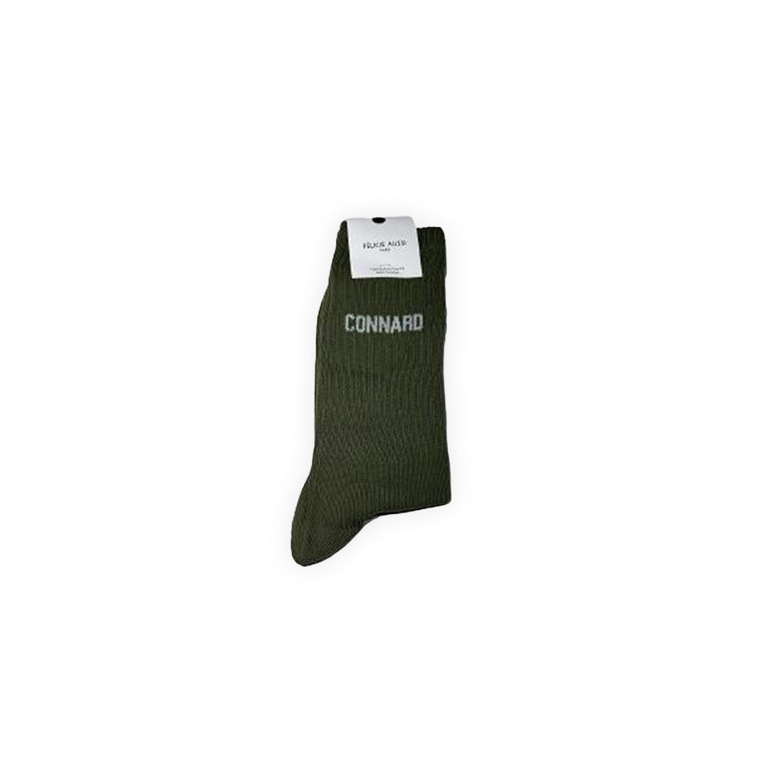 Paire de chaussettes couleur kaki avec lettrage blanc : "Connard"