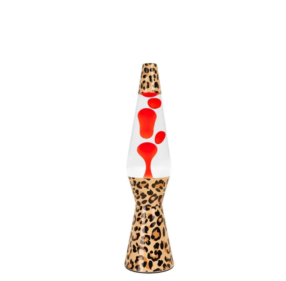 Lampe à lave fusée motif léopard. Bulles rouges et liquide transparent.
